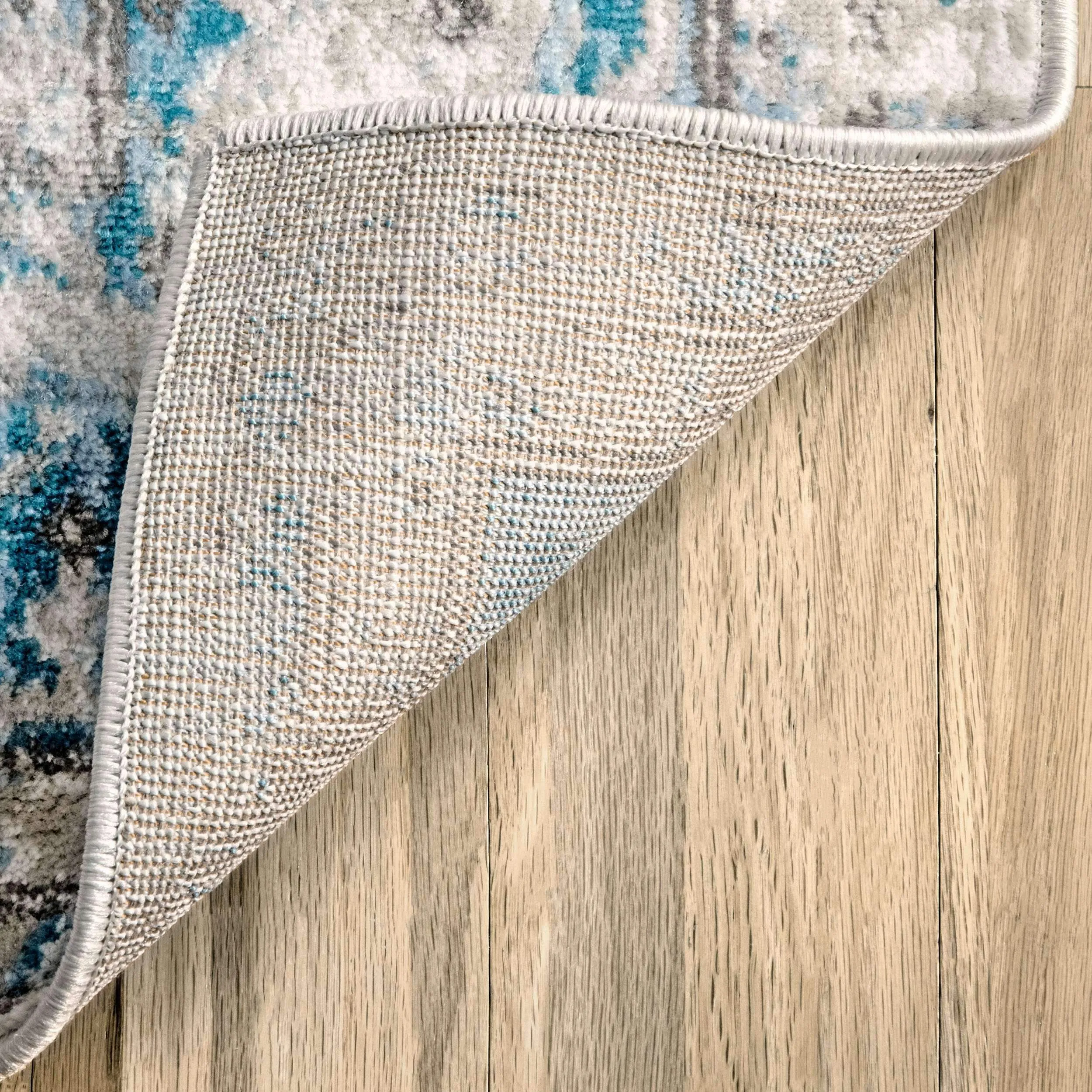 BLUE BARBED MEDALLION RUG
