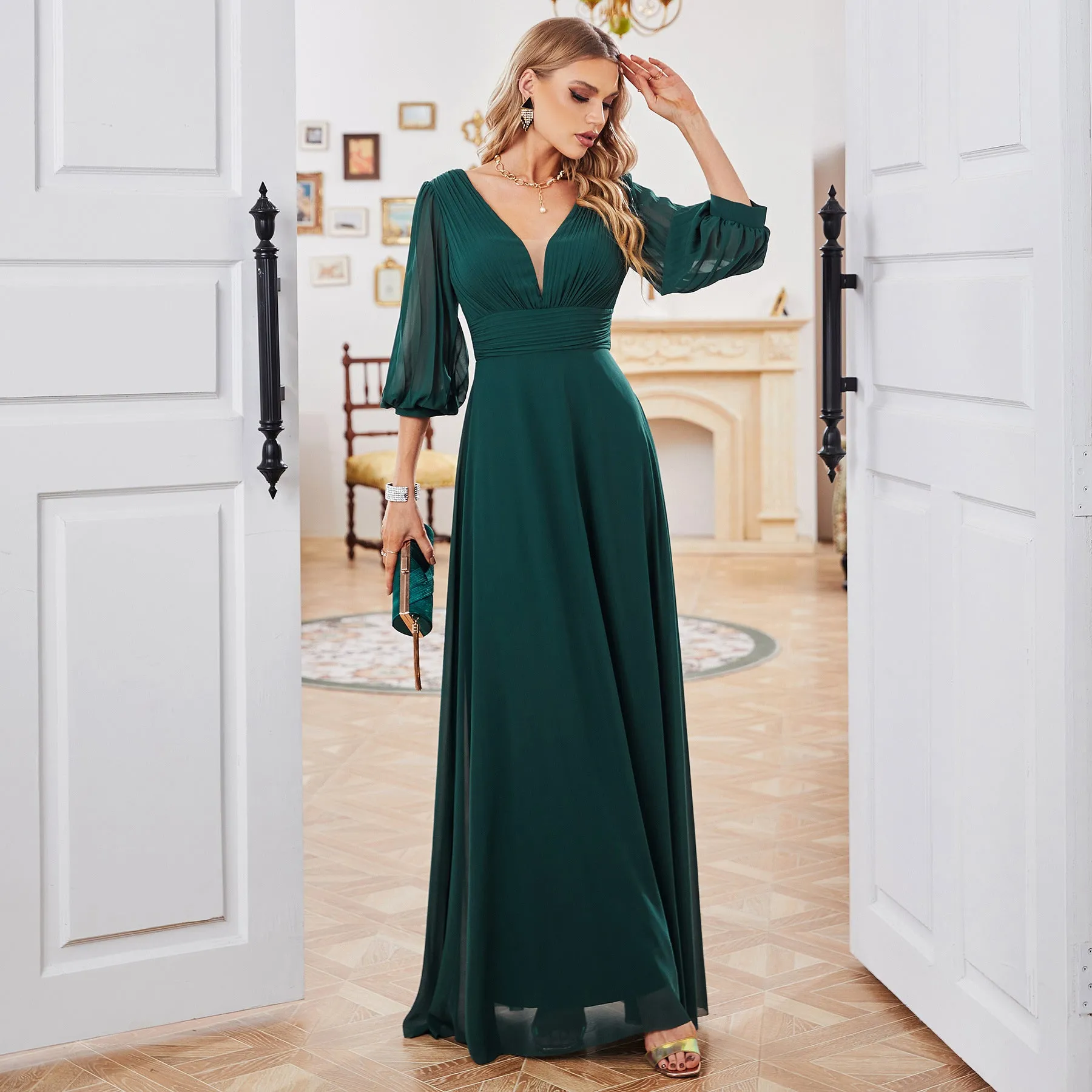 Elegant Flowing Chiffon Gown with Sheer Sleeves and Deep V-Neck