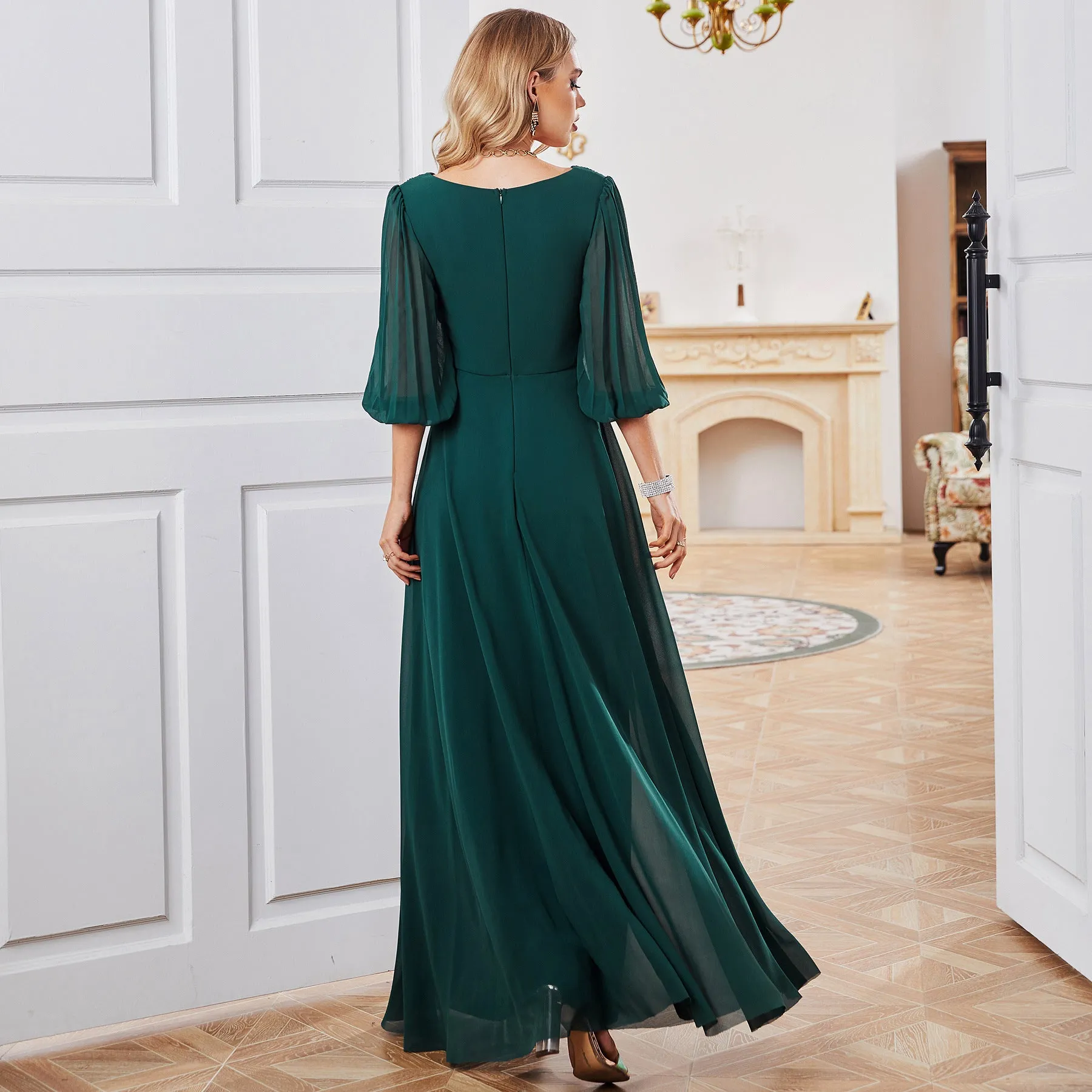 Elegant Flowing Chiffon Gown with Sheer Sleeves and Deep V-Neck