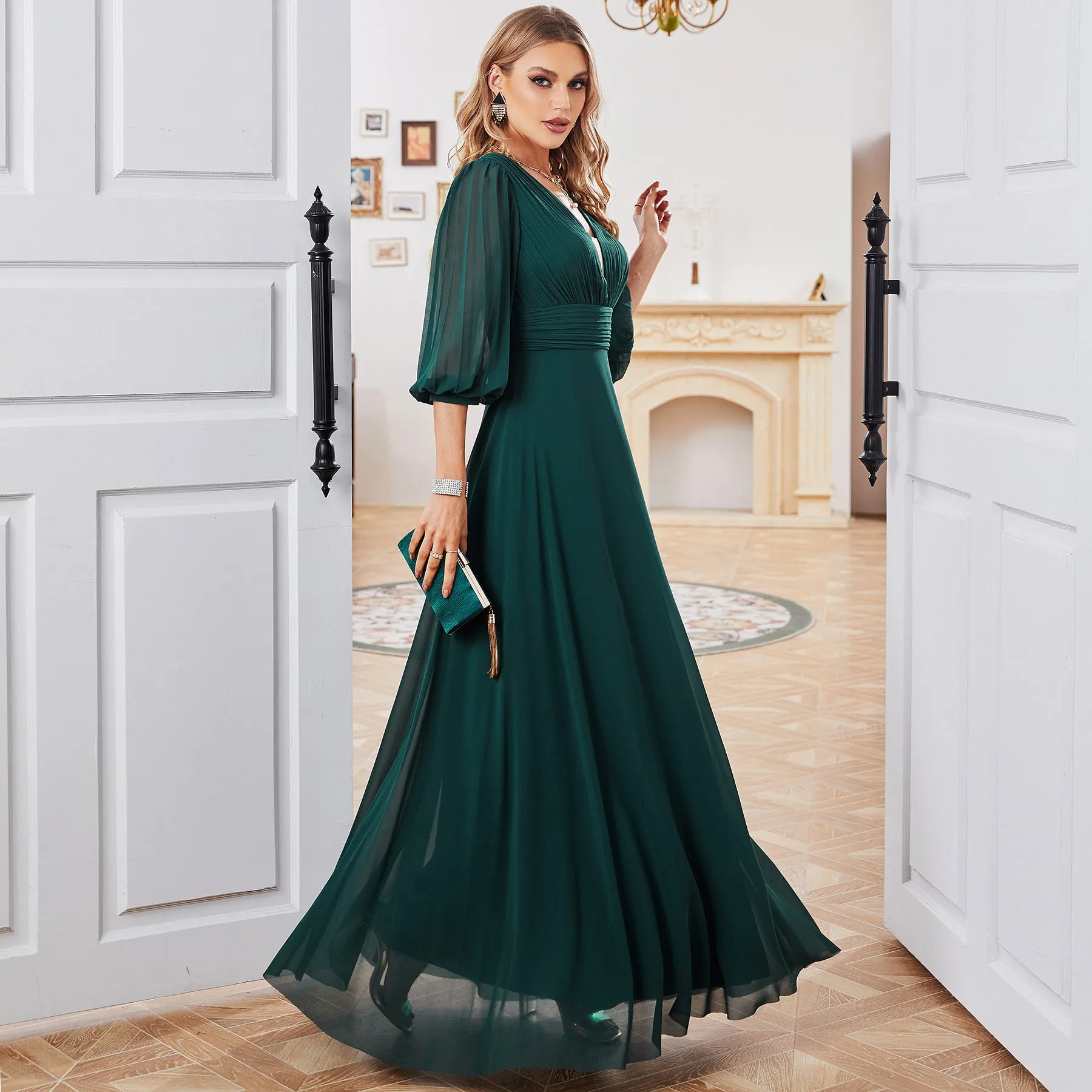 Elegant Flowing Chiffon Gown with Sheer Sleeves and Deep V-Neck