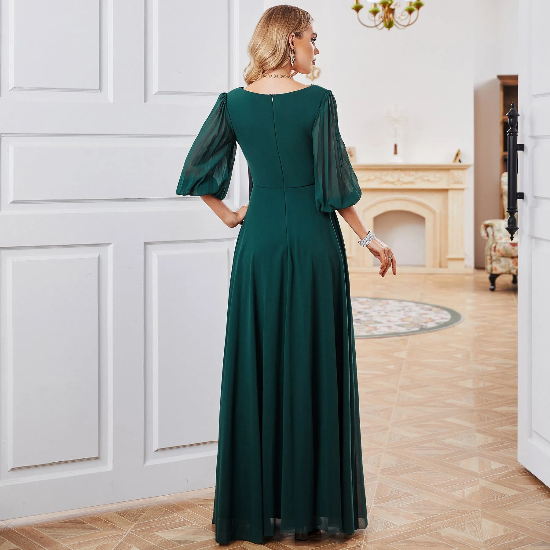 Elegant Flowing Chiffon Gown with Sheer Sleeves and Deep V-Neck