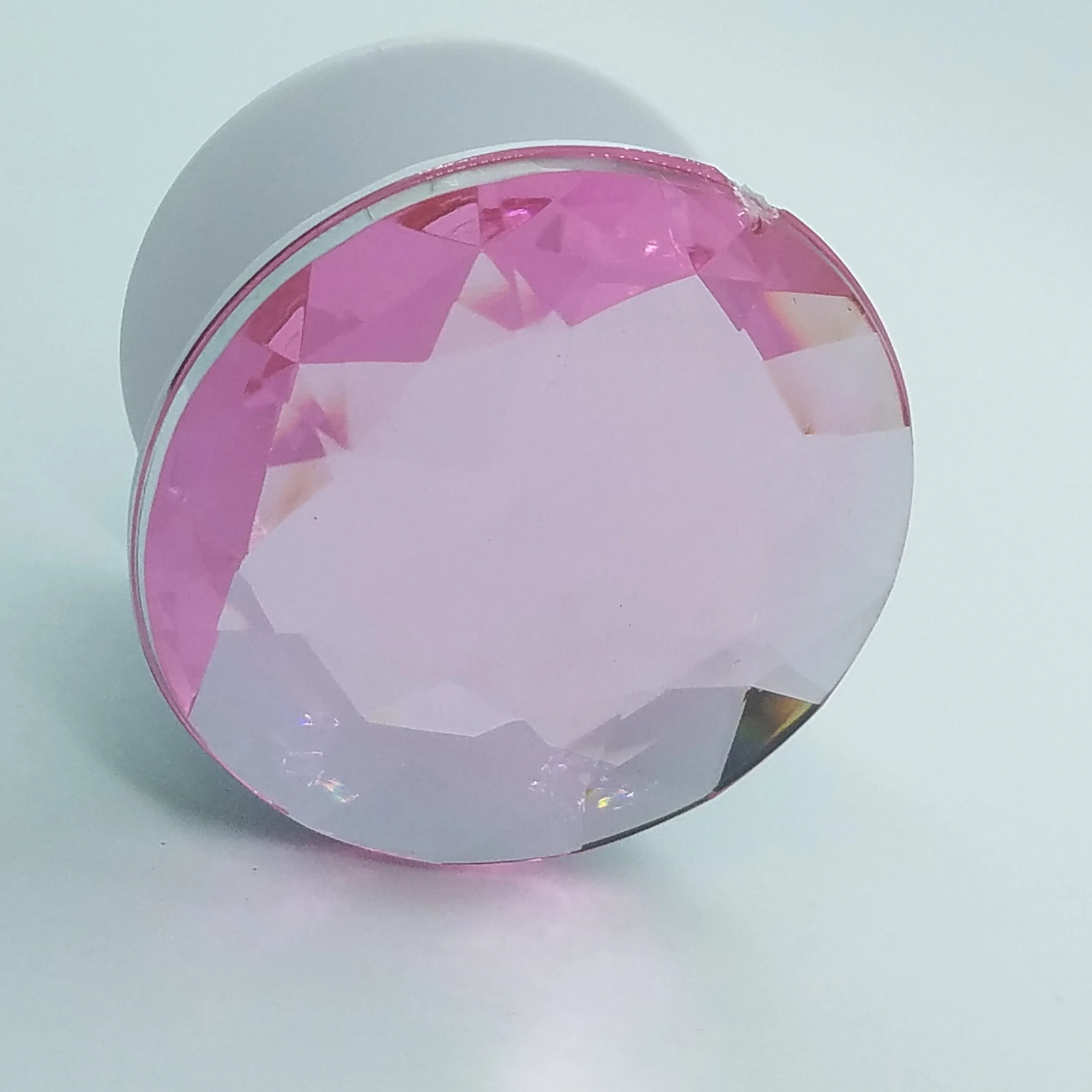 Plastic jewel pop up stand and grip