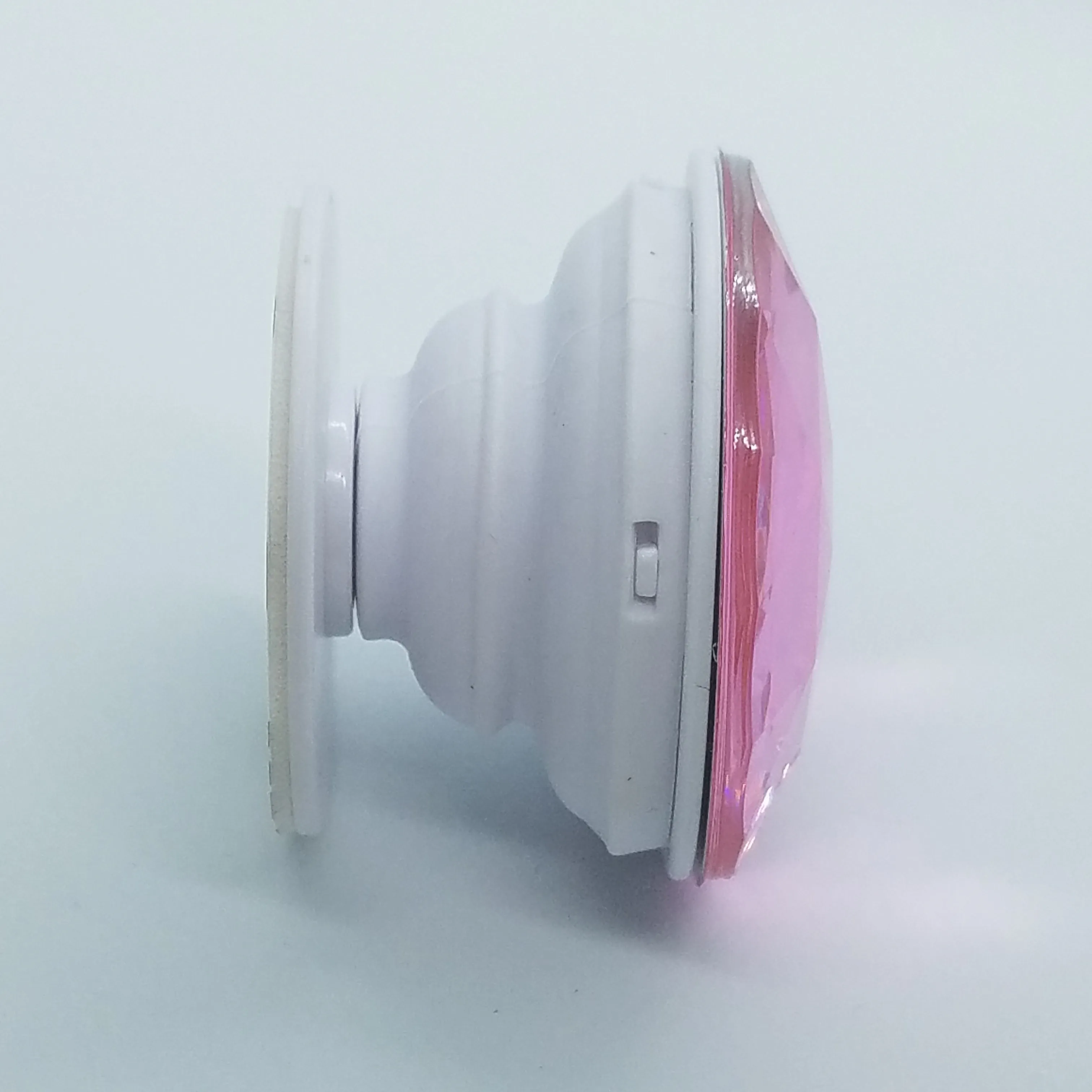 Plastic jewel pop up stand and grip