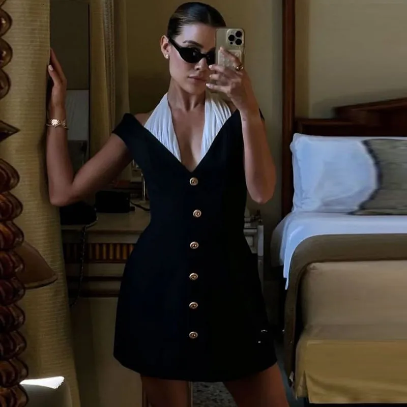 Trendy and Elegant Black and White Contrast Halter Neck A-line Dress for Fashion-Forward Style Enthusiasts